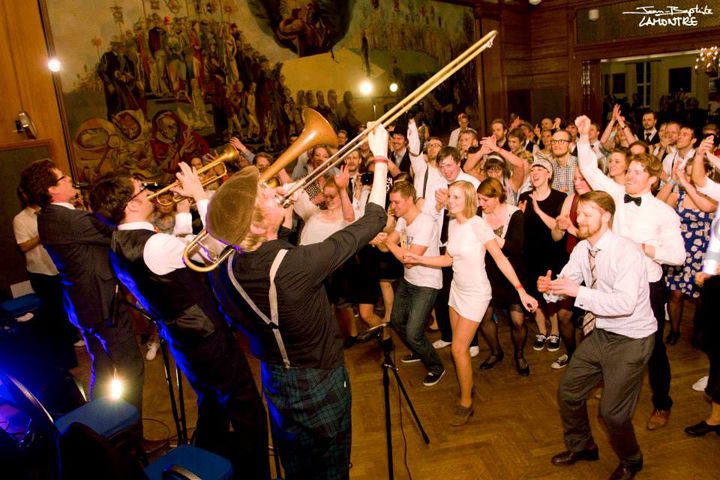 Jazz band performing to lindy hop dancers